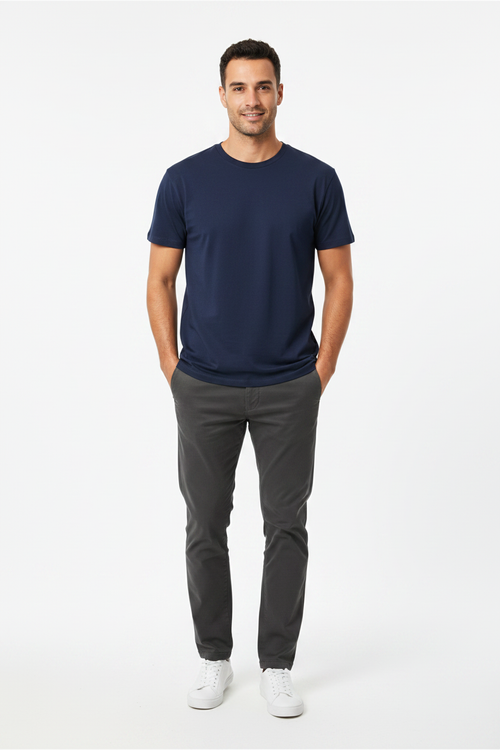 Person wearing Atta navy blue 220gsm combed cotton t-shirt, regular fit lifestyle mockup